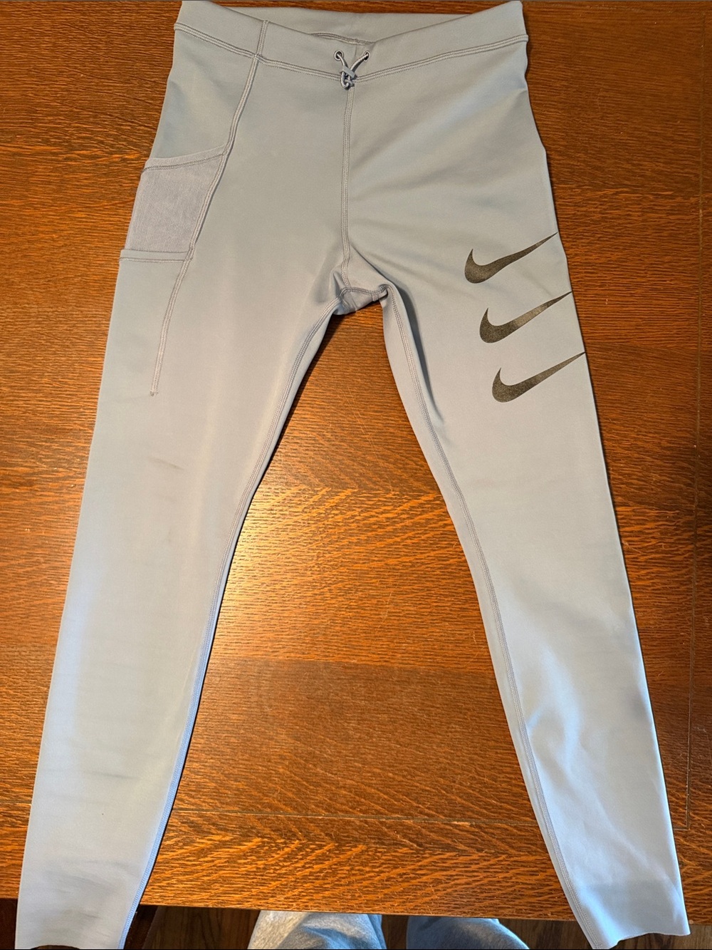 Women’s  Nike Light Gray Performance Leggings with Swoosh Detail